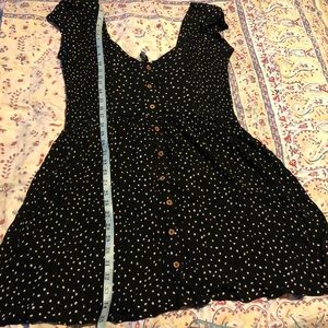 Ditsy polka dot smocked off the shoulder dress.